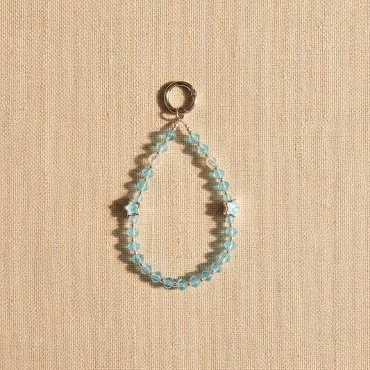 Aqua Crystal Star Charm - Beige Linen Flat Lay Studio Shot