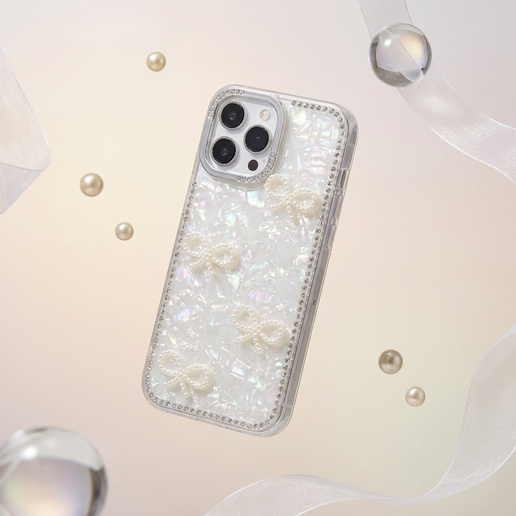 iPouch Pearl Shell Bow iPhone Case front view showing rhinestone border and holographic shell