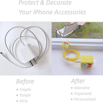 Yellow square smiley character charger cover and mini cable protector with yellow spiral cable wrap next to iPhone and sticker book