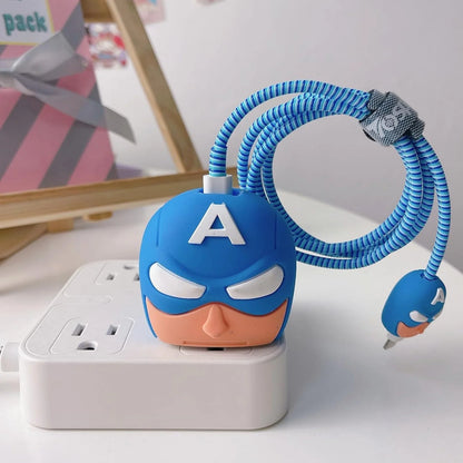 Blue hero mask charger cover and cable protector held in hand