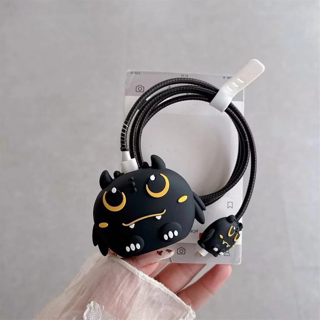 Matte black dark dragon monster charger cover and cable protector set on retail card packaging