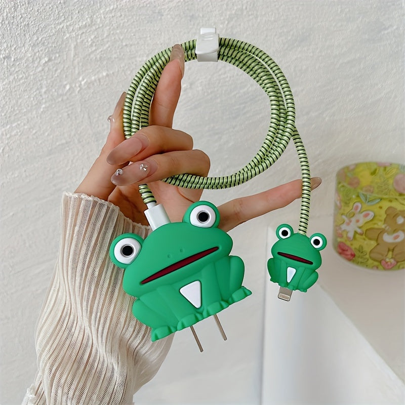 Green frog charger cover and mini frog cable protector held in hand with green spiral cable wrap