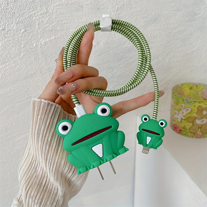 Green frog charger cover and mini frog cable protector held in hand with green spiral cable wrap