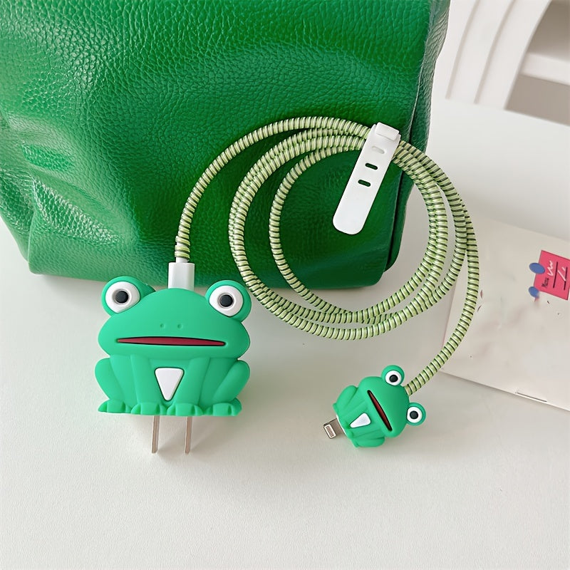 Green frog charger cover on adapter with green spiral cable wrap against green leather bag