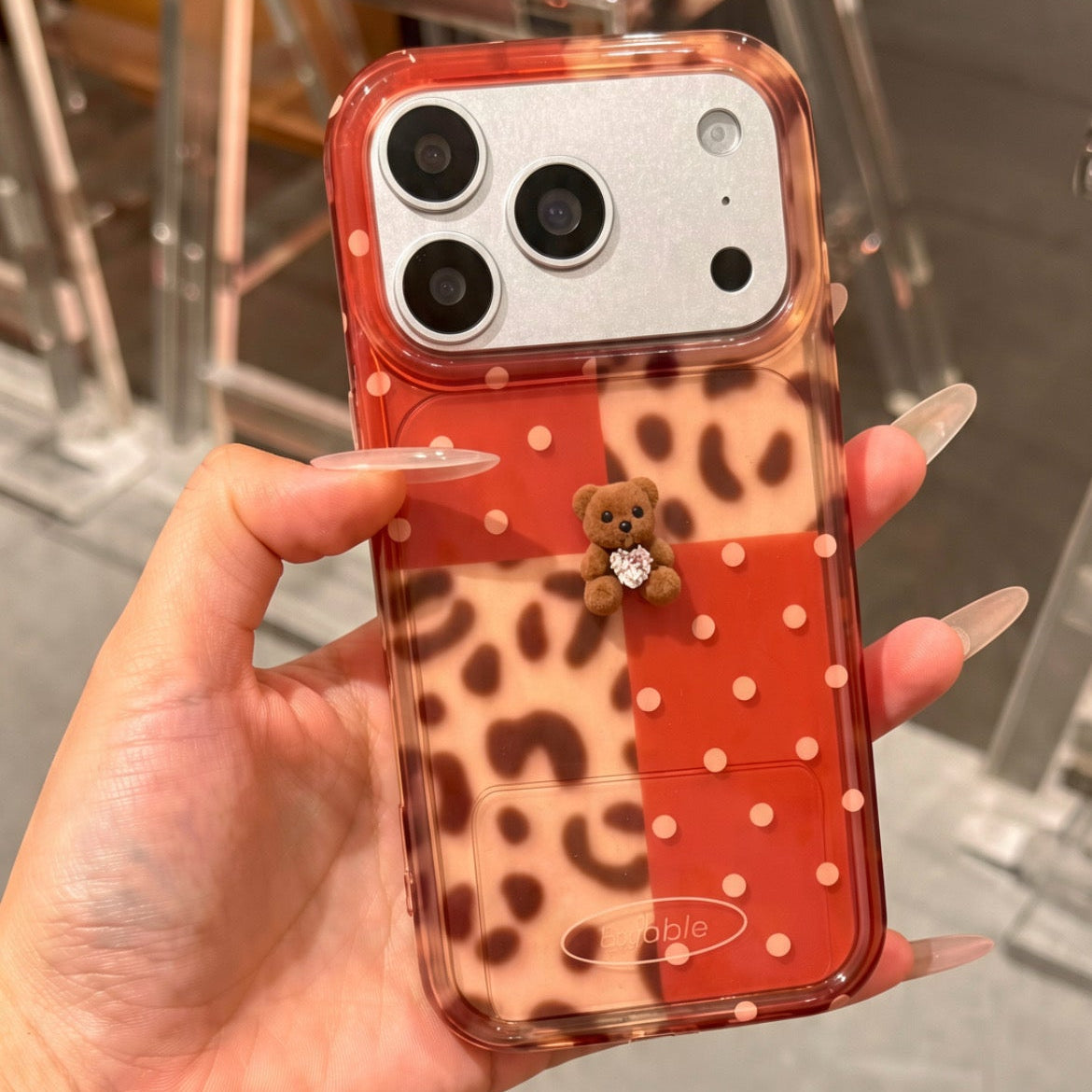 Bubble case on marble table - café lifestyle shot