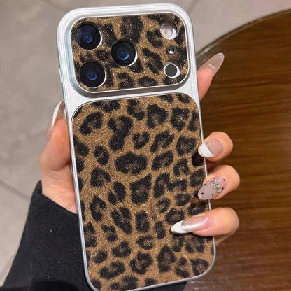 Phone case with leopard print held by a person