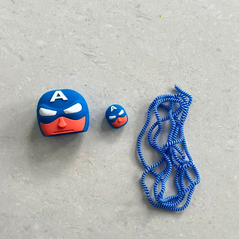 Blue hero mask charger cover, cable protector and cable winder flat lay