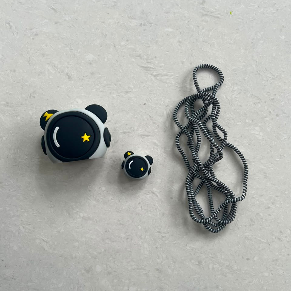 Cute panda face charger cover, cable protector and cable winder flat lay