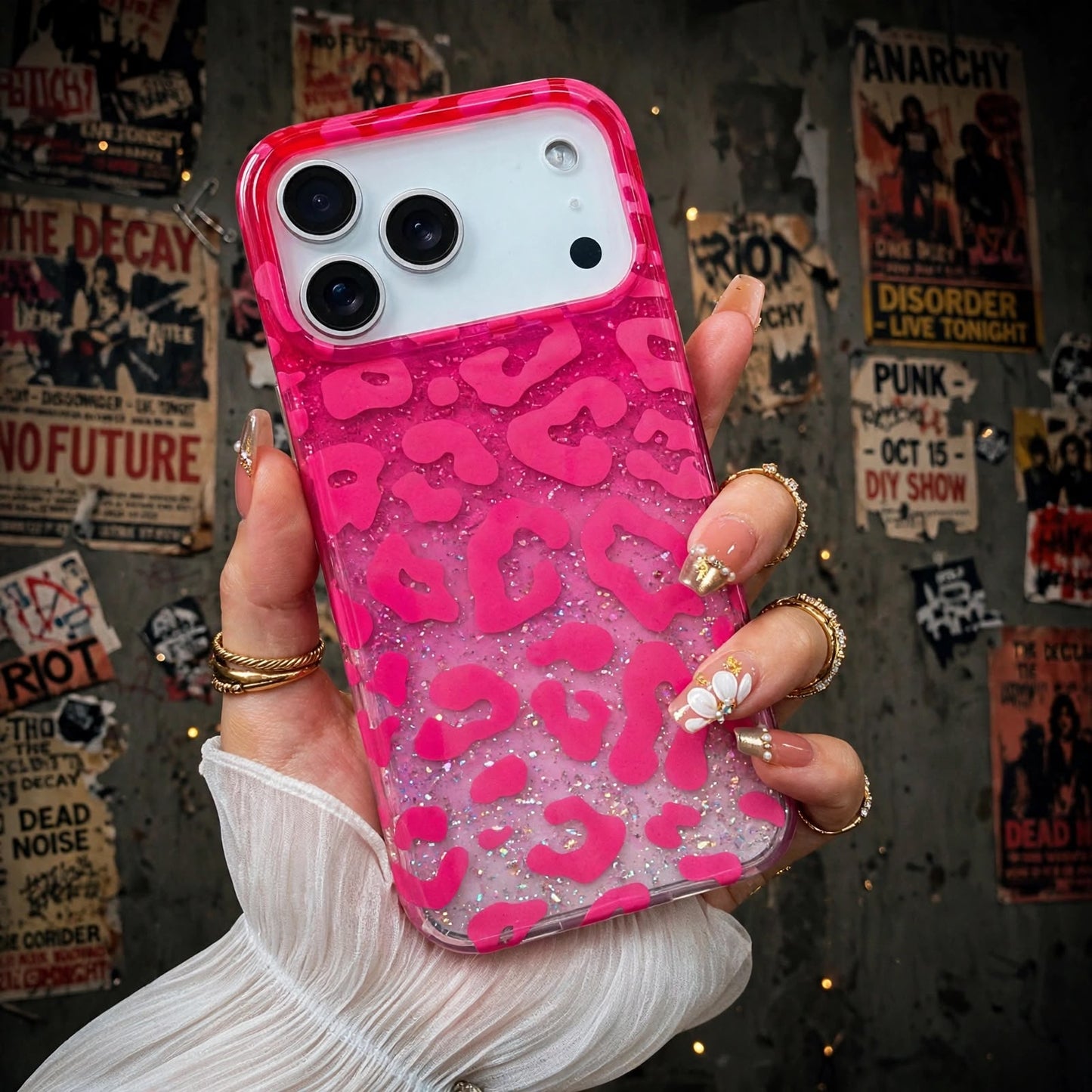 Pink leopard glitter iPhone case front view on wooden surface
