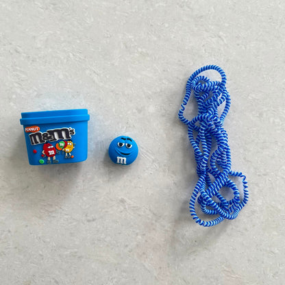 Blue candy box charger adapter cover, mini round candy cable protector and blue spiral cable wrap components flat lay on white surface