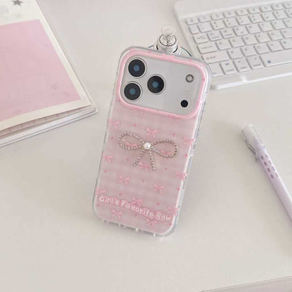 Girl's Favorite Bow pink iPhone case on pink journal lifestyle flat lay