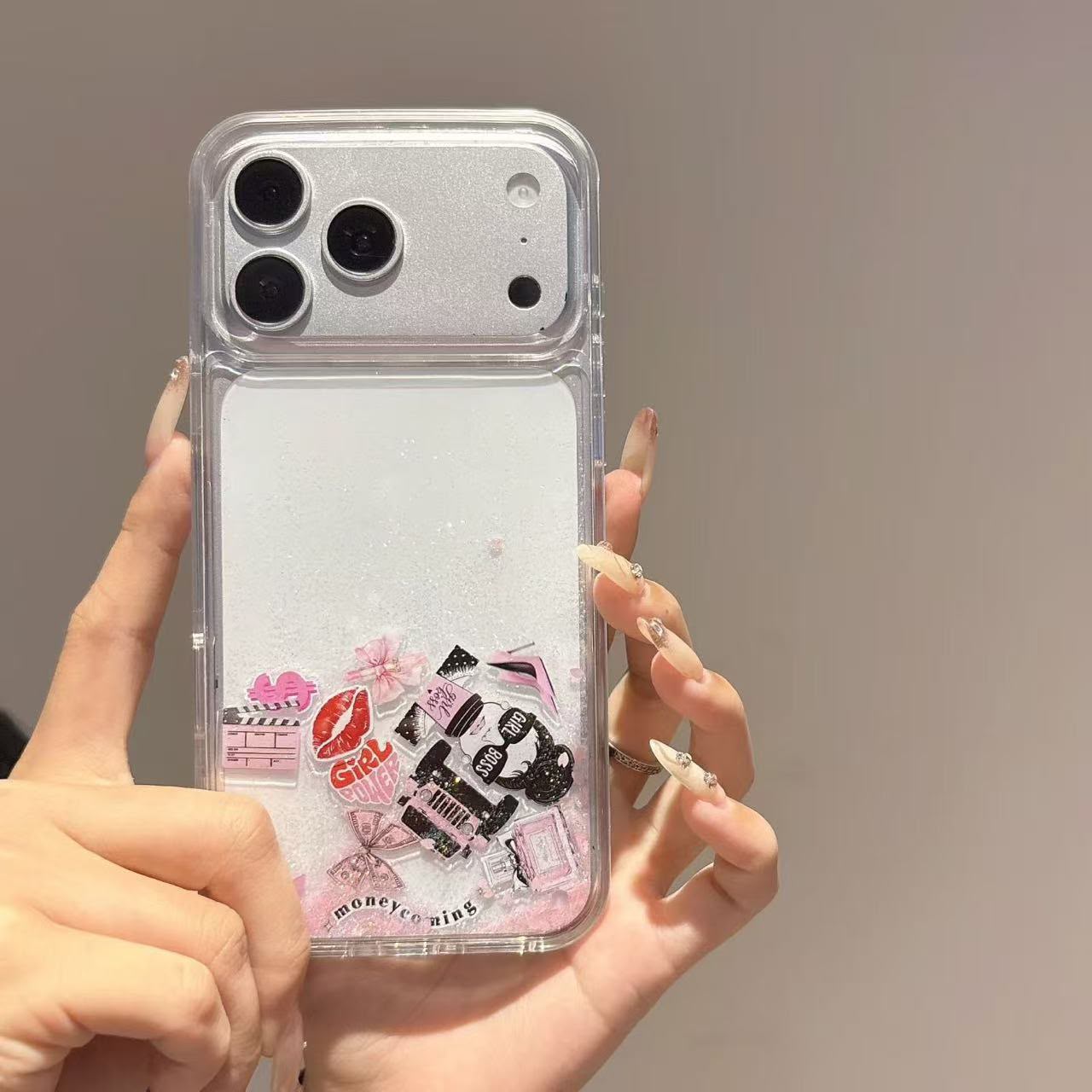 Girl Boss glitter quicksand iPhone case lifestyle shot on desk