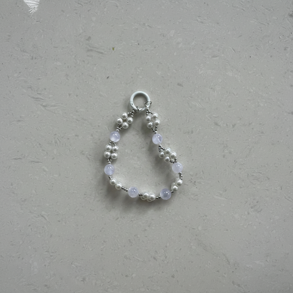 Pearl Moonstone Phone Charm - Flat Lay Top Down Studio Shot