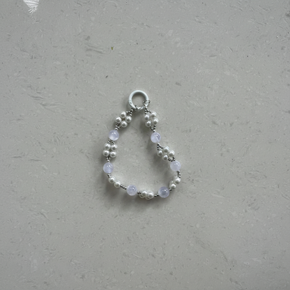 Pearl Moonstone Phone Charm - Flat Lay Top Down Studio Shot