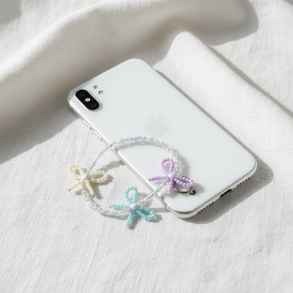 Pastel Dragonfly Phone Charm - Lifestyle Shot on White iPhone