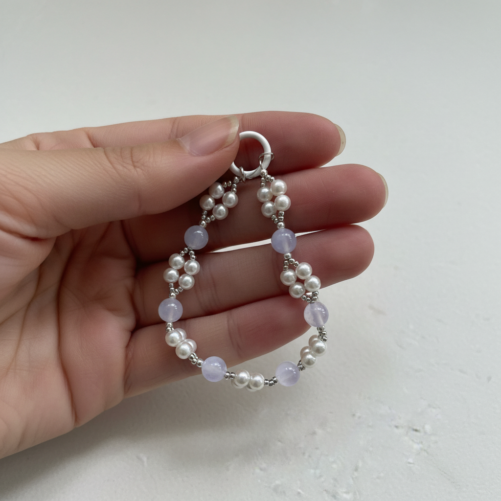 Pearl Moonstone Phone Charm - Hand Lifestyle Shot
