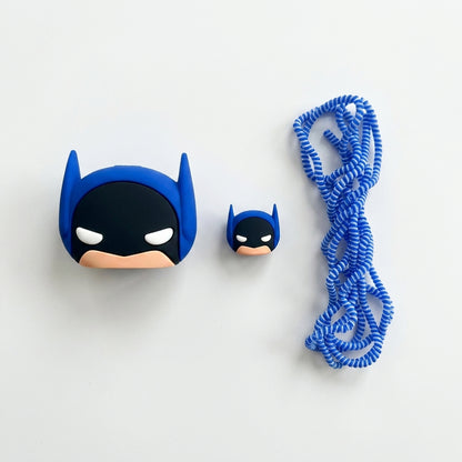 Blue Batman charger adapter cover flat lay with mini Batman cable protector and blue coil winder on white background
