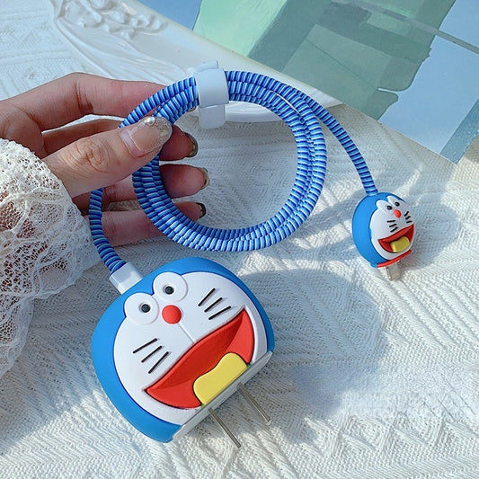 Blue kawaii cat face charger cover and cable protector held up